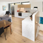 a clever use of space maximises the size of this kitchen and the marble adds a splash of luxury
